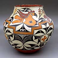 A polychrome storage jar decorated with a pie crust rim and decorated with a four-panel parrot, flower, rainbow, fine line, rain cloud pattern and geometric design
 by Unknown of Acoma