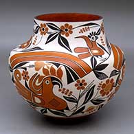 A polychrome jar decorated with a three-panel parrot, rainbow, flower and geometric design
 by Barbara and Joseph Cerno Sr of Acoma