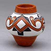 A miniature polychrome replica of a pot and design popular between 1780 and 1800
 by Wanda Aragon of Acoma