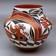 A polychrome jar decorated with a four-panel parrot, flower, rainbow and geometric design
 by Barbara and Joseph Cerno Sr of Acoma