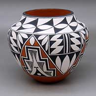 A polychrome jar decorated with a four panel kiva step, pumpkin seed and geometric design
 by Rachel Aragon of Acoma
