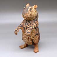 A standing chipmunk figure made of mixed clay and decorated with a checkerboard and geometric design
 by Nicolas Ortiz of Mata Ortiz and Casas Grandes
