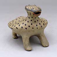 A polychrome horned toad figure
 by Unknown of Cochiti