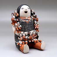 A grandmother storyteller with seventeen children, click or tap to see a larger version