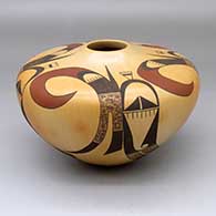 A flat-top polychrome jar decorated with a four-panel bird element and geometric design
 by Mark Tahbo of Hopi