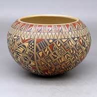 A polychrome bowl decorated with a four-panel small sherd and geometric design
 by Rondina Huma of Hopi