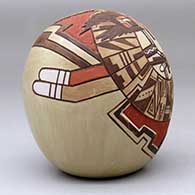 A polychrome seed pot decorated with a lightly-carved, sgraffito-and-painted katsina, dancer, pueblo wall, bird elements, ears of corn and rock art geometric design, click or tap to see a larger version