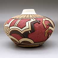 A polychrome jar carved and painted with a corn maiden, corn plant, feather and geometric design, click or tap to see a larger version