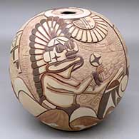 A polychrome seed pot carved and painted with warrior kachinas dancing and praying for the gentle side of life
 by Gary Polacca Nampeyo of Hopi