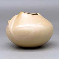 A buff jar with an organic opening and a carved ear of corn applique, click or tap to see a larger version