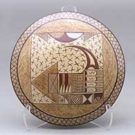 Click for a larger view A polychrome seed pot decorated above the shoulder with a bird element, crosshatching and geometric design
by Nona Naha of Hopi