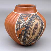 A polychrome jar with two panels of melon design and two panels of painted corn stalk and geometric design
 by Leonora Fragua of Jemez