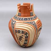 A polychrome jar decorated with a four-panel carved and painted corn plant, rainbow, kiva step and geometric design
 by Bertha Gachupin of Jemez