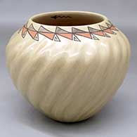 A polychrome ribbed melon jar decorated with a necklace of geometric design around the opening
 by Juanita Fragua of Jemez