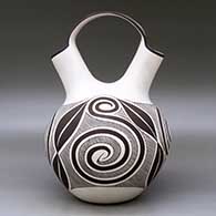 A black on white wedding vase decorated with a Tularosa spiral, fineline and geometric design, click or tap to see a larger version