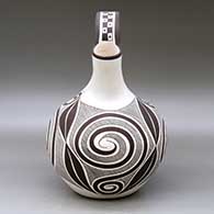 A black on white wedding vase decorated with a Tularosa spiral, fineline and geometric design, click or tap to see a larger version