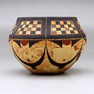 A polychrome mixed clay bowl decorated around the body with a six-panel checkerboard and geometric design, click or tap to see a larger version