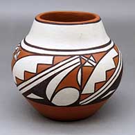 A polychrome jar decorated with a four-panel geometric design
 by Gladys Paquin of Laguna