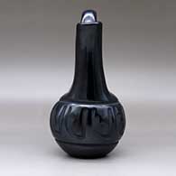 A black wedding vase carved around the body with a geometric design, click or tap to see a larger version