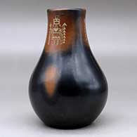 A black vase with sienna spots and a three panel sgraffito yeibichai and geometric design, click or tap to see a larger version