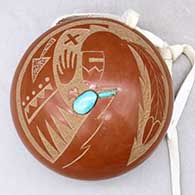 A small red spoutless canteen decorated on top with a sgraffito pueblo dancer, feather and geometric design
 by TsePe of San Ildefonso