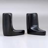 A pair of black candlestick holders, click or tap to see a larger version