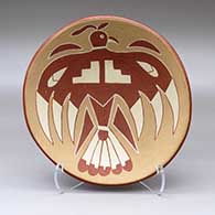 A polychrome bowl decorated on the inside with a thunderbird and geometric design
 by Unknown of San Juan