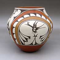 A polychrome jar decorated with a four-panel roadrunner, rainbow and geometric design
 by Eusebia Shije of Zia