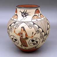 A polychrome jar decorated with a three panel pueblo dancer, roadrunner, fineline and geometric design
 by Marcellus Medina of Zia