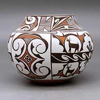 A polychrome jar decorated with a four panel deer in his house, rainbird, fineline and geometric design, click or tap to see a larger version