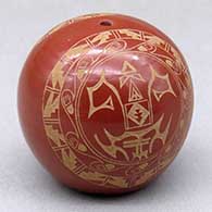 A miniature red seed pot decorated with a two panel sgraffito geometric design
 by Grace Medicine Flower of Santa Clara