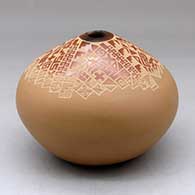 A multi-tone seed pot decorated above the shoulder with a five panel sgraffito small sherd and geometric design
 by Jody Naranjo of Santa Clara