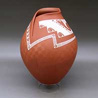 A white on red jar with an organic cut opening and decorated with a sgraffito and painted fineline and geometric design
 by Diego Valles of Mata Ortiz and Casas Grandes