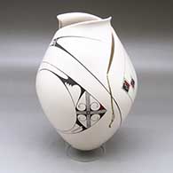 Click for a larger view A polychrome jar with an organic cut opening and decorated with a flowing two panel geometric design
by Diego Valles of Mata Ortiz and Casas Grandes