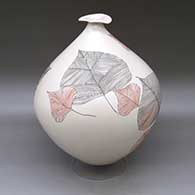 A polychrome jar with a thin neck and leaf-shaped rim and decorated with a leaf and geometric design
 by Diego Valles of Mata Ortiz and Casas Grandes