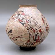 A polychrome mixed clay jar decorated with a two panel serpent, sickle and geometric design, click or tap to see a larger version