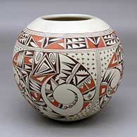 A polychrome jar decorated with a three panel bird element, field of stars and geometric design
 by Irma David of Hopi