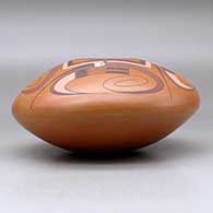 A polychrome bowl decorated above the shoulder with a four panel bird element and geometric design, click or tap to see a larger version