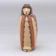 A polychrome Singing Mother wearing a manta decorated with a geometric design
 by Maxine Toya of Jemez