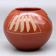 Click for a larger view A red jar decorated with a two panel sgraffito feather and geometric design plus two inlaid pieces of turquoise
by Tony Da of San Ildefonso