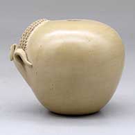 A small buff seed pot decorated with an ear of corn applique, click or tap to see a larger version