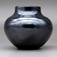 A plain, polished black jar with fire clouds, click or tap to see a larger version