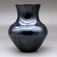 A plain polished black vase, click or tap to see a larger version