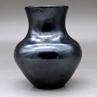 A plain polished black vase, click or tap to see a larger version