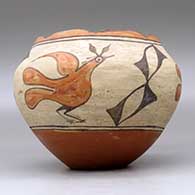 A polychrome jar with a scalloped rim and decorated with a three-panel roadrunner and geometric design, click or tap to see a larger version