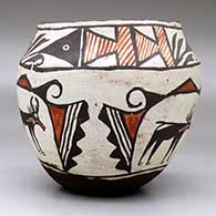 A polychrome jar decorated with a three-panel deer-in-his-house and geometric design, click or tap to see a larger version