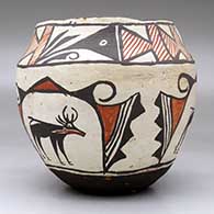 A polychrome jar decorated with a three-panel deer-in-his-house and geometric design, click or tap to see a larger version