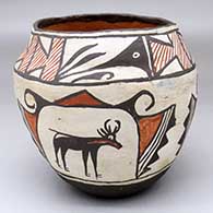 A polychrome jar decorated with a three-panel deer-in-his-house and geometric design
 by Unknown of Zuni
