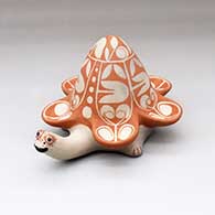 A polychrome turtle figure with a geometric design  on its shell
 by Lisa Holt of Cochiti