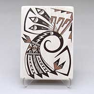 A polychrome tile decorated with a bird element and geometric design
 by Les Namingha of Hopi